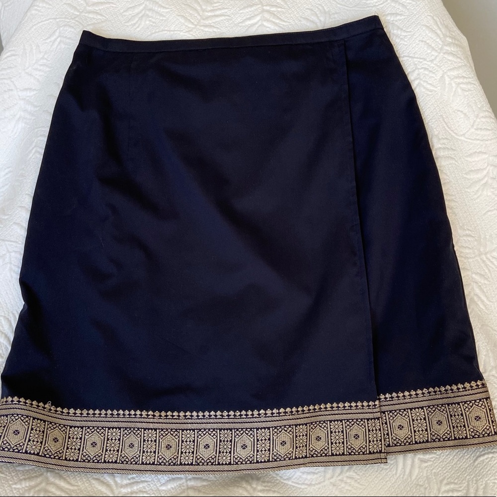 Silky feel, easycare polyester, faux-wrap skirt